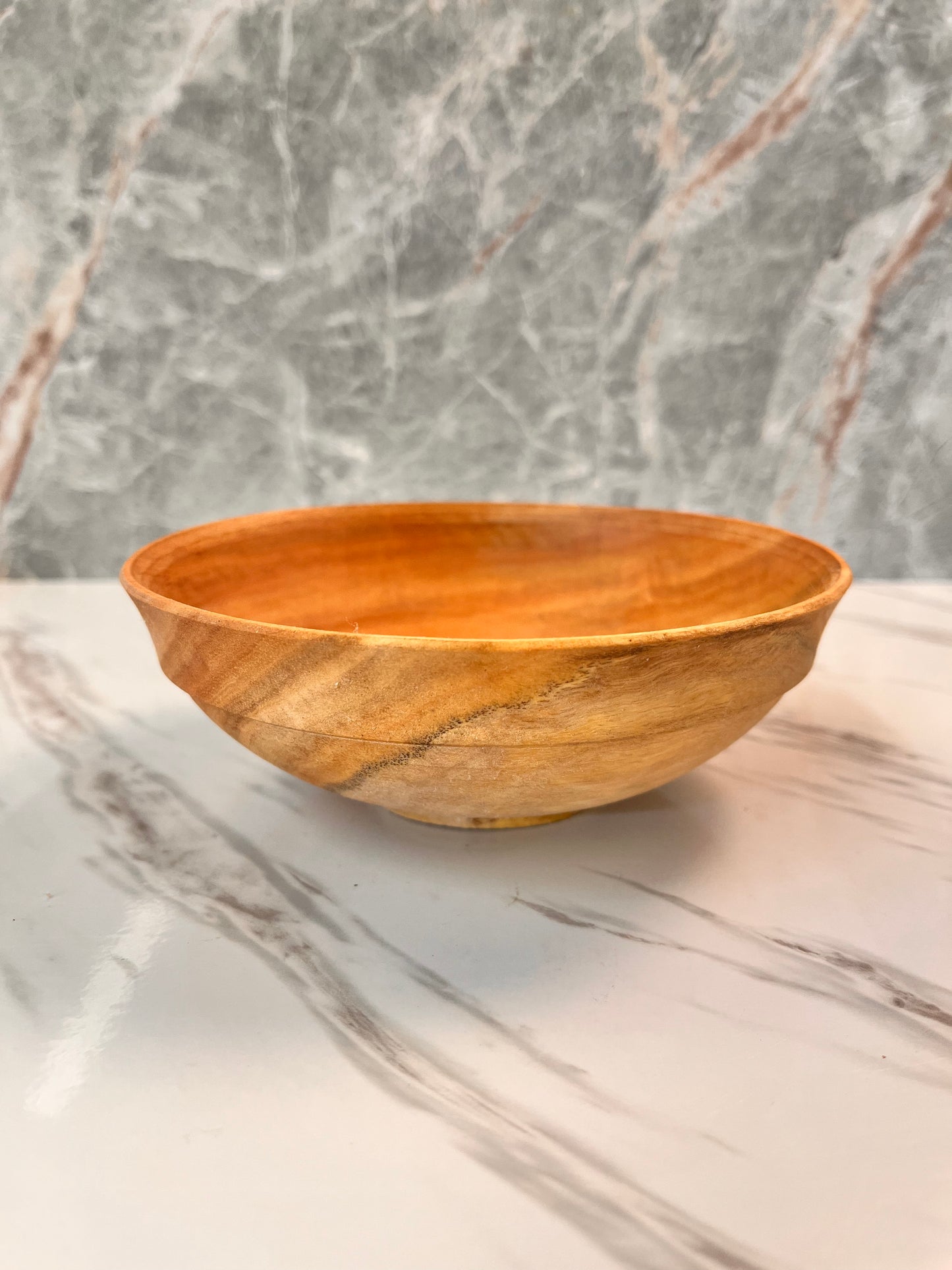 A 5-3/4" by 2" eucalyptus bowl