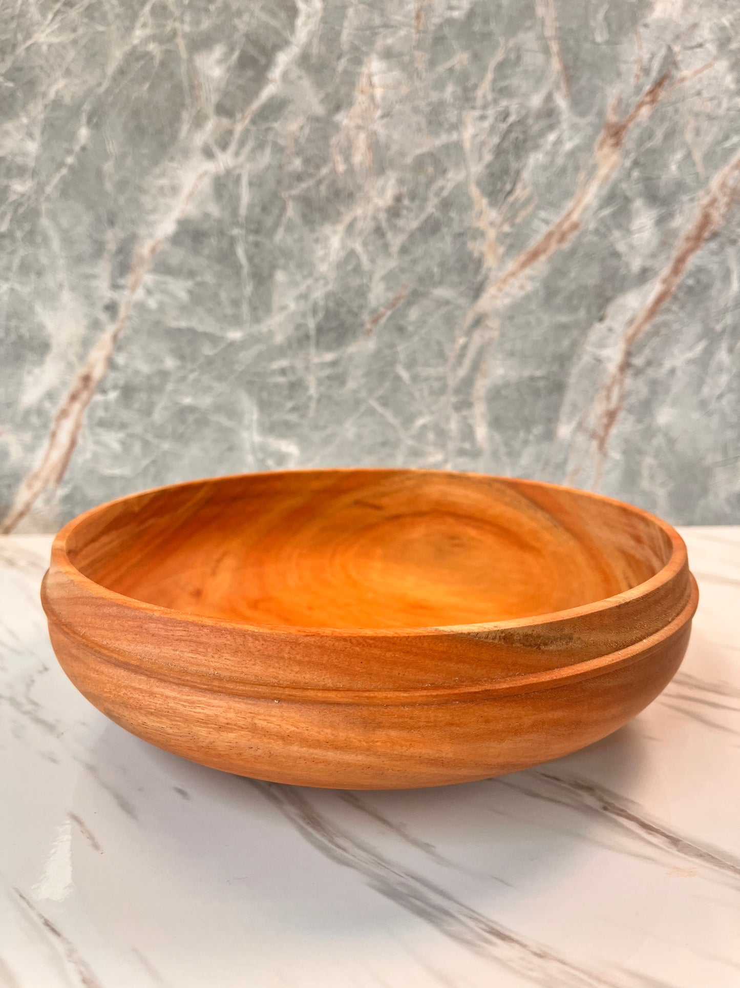 Shallow eucalyptus fruit bowl that measures 8" x 2 1/2"