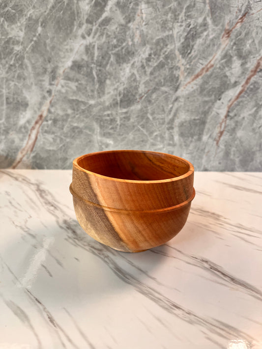 A eucalyptus bowl with a bead dimensions are about 4 1/2" x 3 1/4"