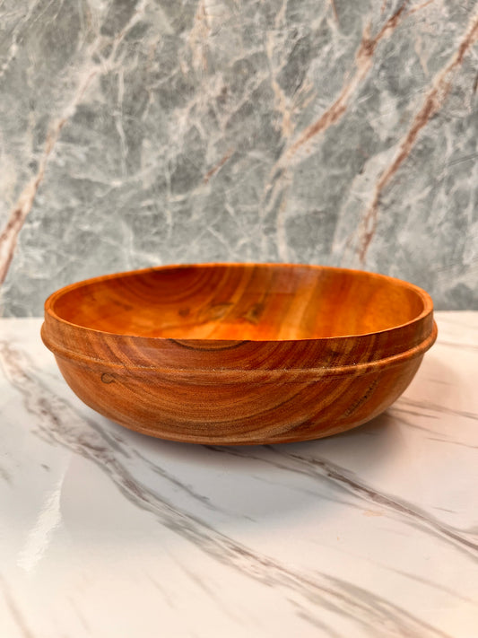 Eucalyptus wood dish with a beaded band measures 8 1/4 inches by 2 1/2 inches